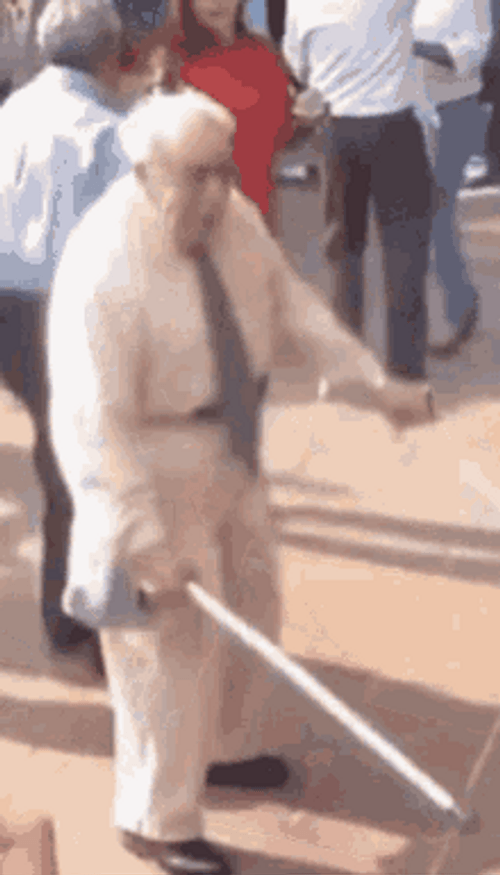Funny Old Man Dancing Throw Canes GIF