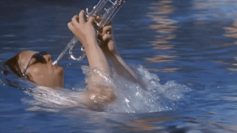Funny Playing Bugle In Water GIF