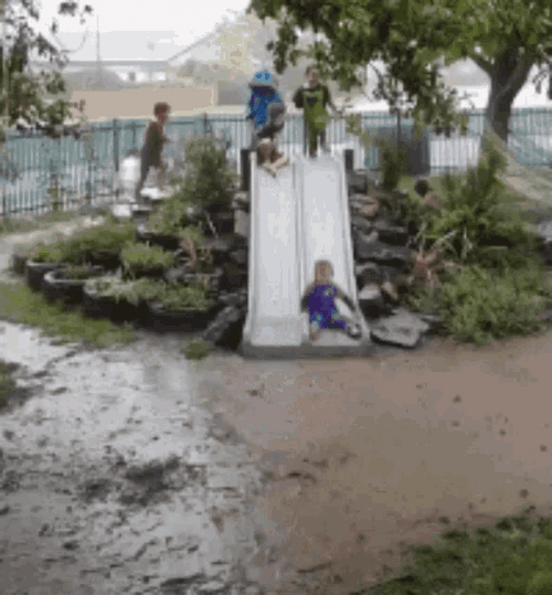 Funny Rain Kid Slides GIF