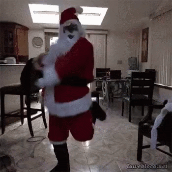 Funny Man In Santa Suit Shaking GIF