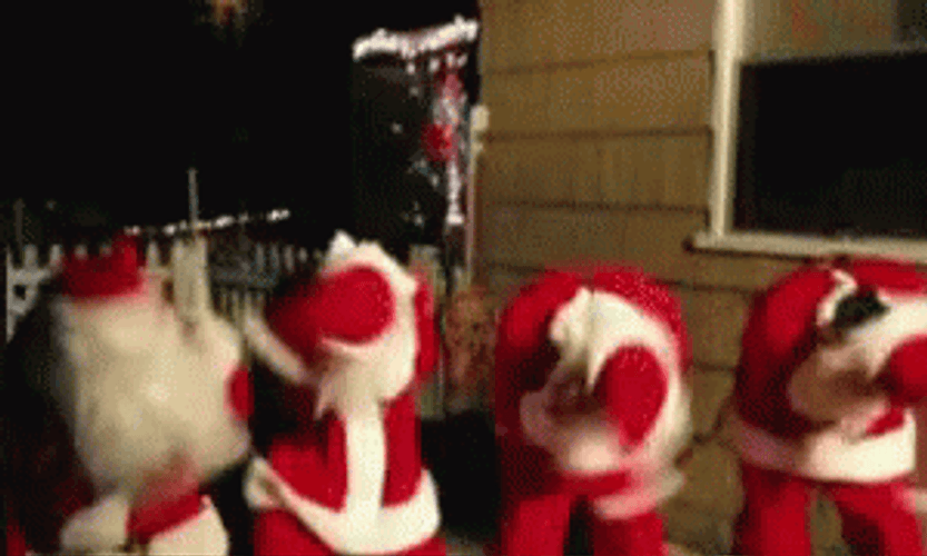 Funny Santa Wannabes Head Banging GIF