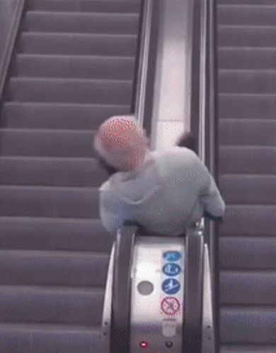 Funny Senile Old Man Spinning Escalator GIF