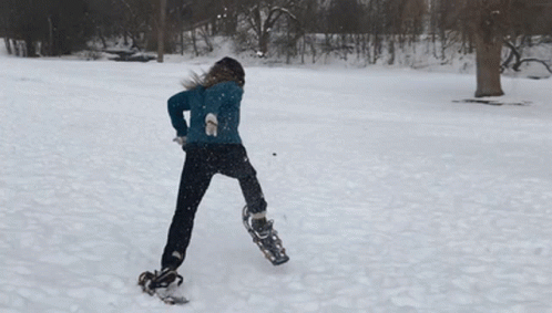 Funny Woman Running In Snow GIF