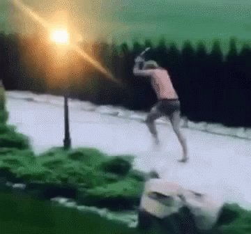 Funny Sprinting Man With Machine Gun In Undies GIF