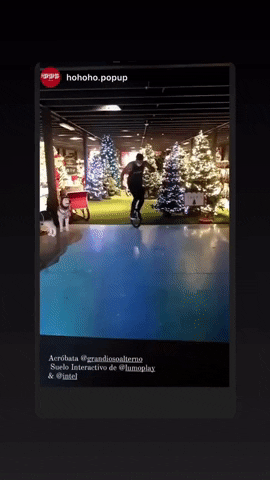 Funny Xmas Shop Unicycling Customer GIF