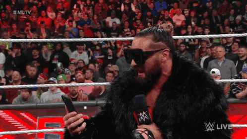 Fur Coat Announcer at Wrestling Show