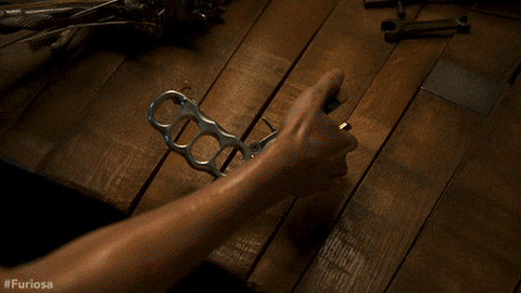 Furiosa Cutting Hair Short GIF