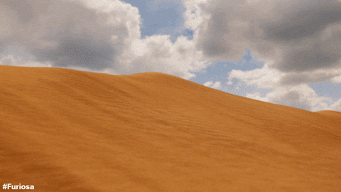 Furiosa Driving In The Dessert GIF