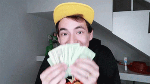Gabriel Dearo Showing Monopoly Money GIF