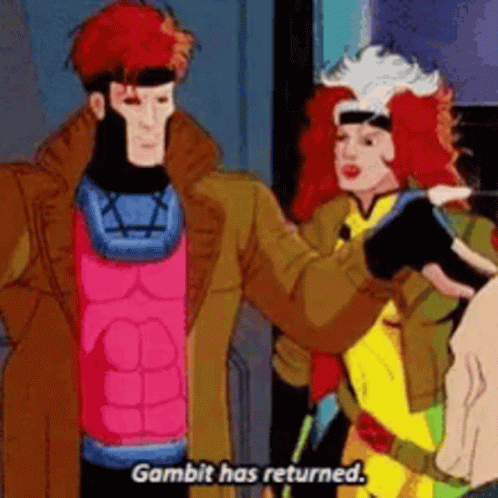 Gambit And Rogue From The X-Men Are Standing Next To Each Other . GIF