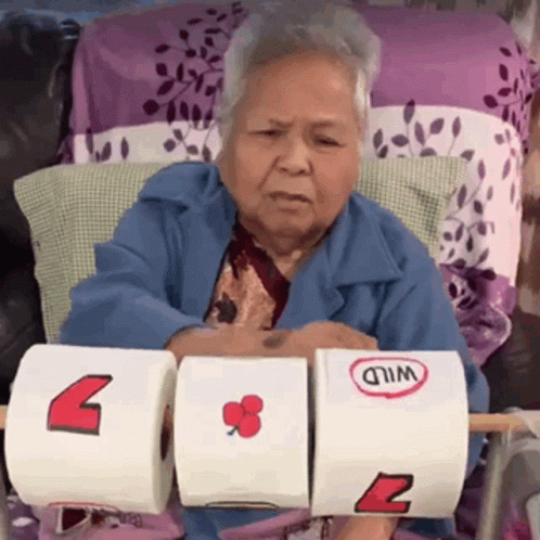 Gambling Funny Lady Playing Tissue Slot Machine GIF