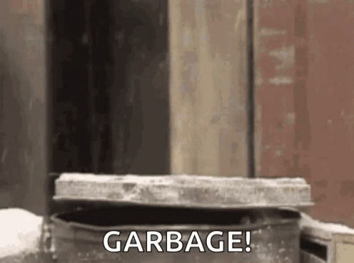 Garbage Can in Front of Building