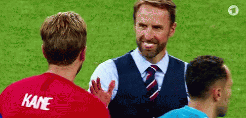 Gareth Southgate And Harry Kane Embrace GIF