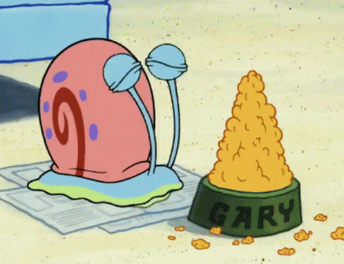 Gary Sitting On Newspaper Next To Bowl Of Food GIF