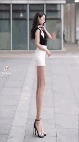 Gaunt Long Legs Tall Lady GIF