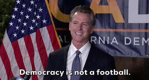 Gavin Newsom Democracy Is Not A Football GIF