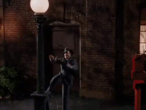 Gene Kelly Rain Dance And Singing GIF