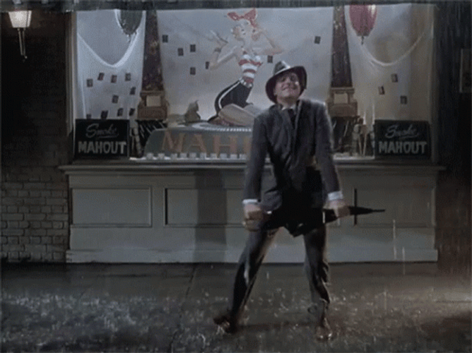 Gene Kelly Slow Dance Singing In The Rain GIF