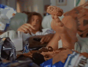 George Of The Jungle Eating Donut GIF