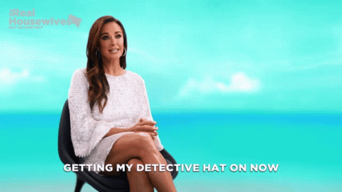 Getting My Detective Hat GIF