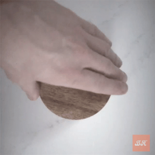 Getting Salt From Jar GIF