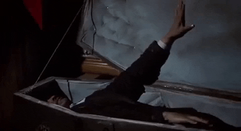 Getting Up From Coffin Classic Horror Movie GIF