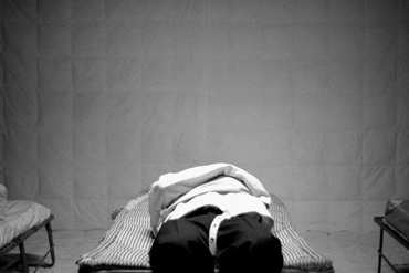 Getting Up Removing Straight Jacket GIF