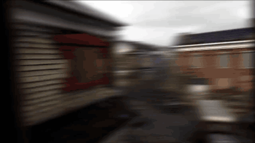 Ghost Town With Neglected Vehicles GIF