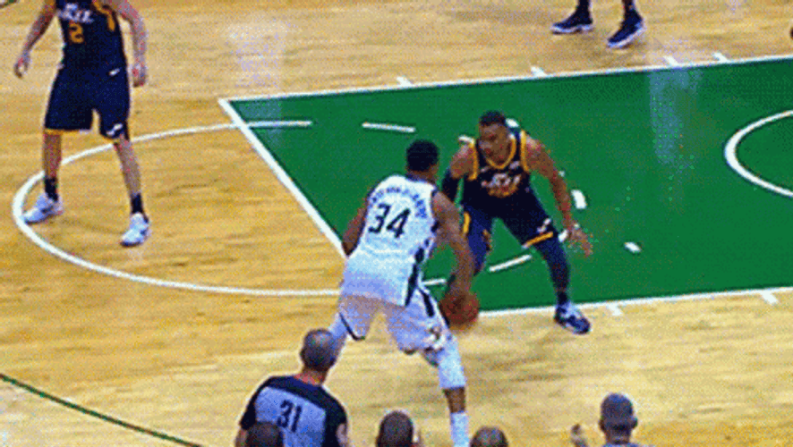 Giannis Antetokounmpo Cross Over Dunk GIF