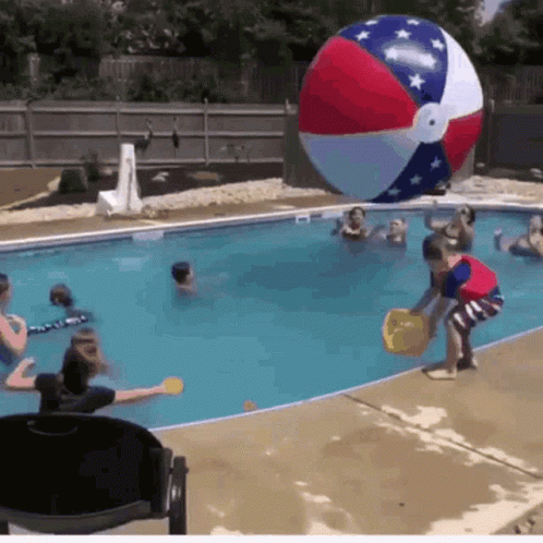 Giant Ball Knocks Little Kids Falling GIF