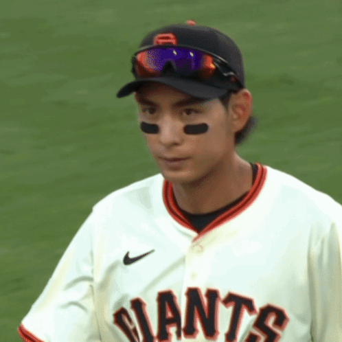 Giants Baseball Player Wearing Sunglasses and Hat