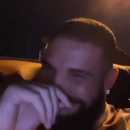 Giggling Laughing Drake Driving GIF