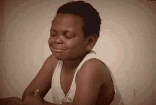 Giggling Shy Kid GIF