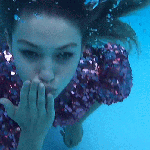 Gigi Hadid Underwater Flying Kiss GIF