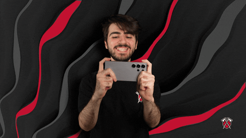 Gimkit Happy Guy Playing Mobile Game GIF