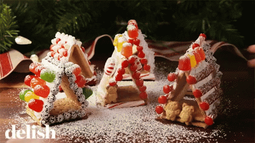 Gingerbread House Decorated With Candy Canes GIF