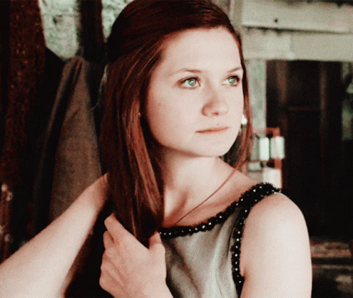 Ginny Weasley Fixing Hair GIF