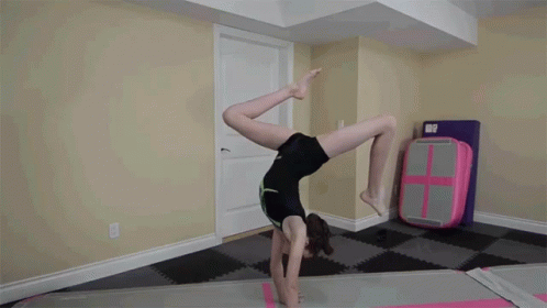 Girl Back Flip on Gym Mat