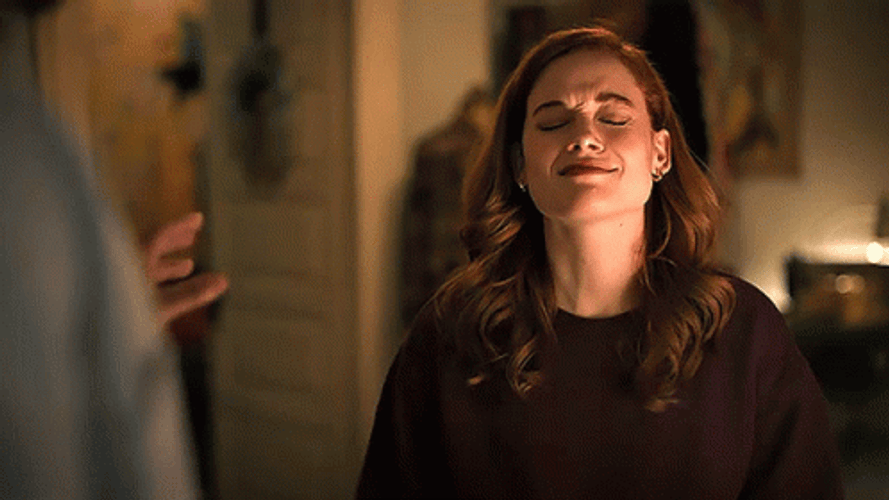 Girl Begging By Showing Heart Hands GIF
