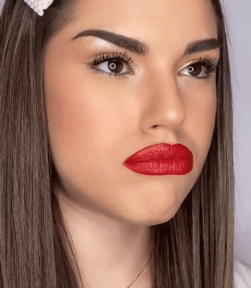 Girl Blow Air To Move Her Lips GIF