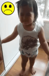 Girl Crying at Sad Mirror