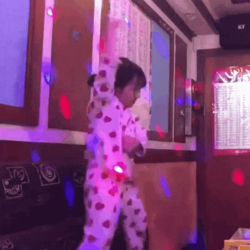 Girl Dancing In Pajamas With Ky Sign GIF