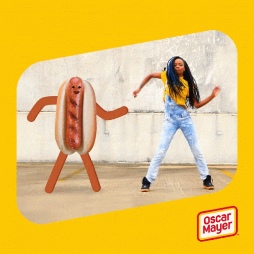 Girl Dancing Next to Oscar Mayer Hot Dog