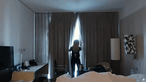 Girl Doing Curtain Opening GIF