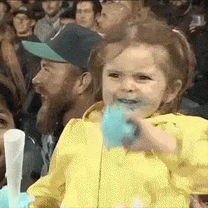 Girl Eating Cotton Candy GIF