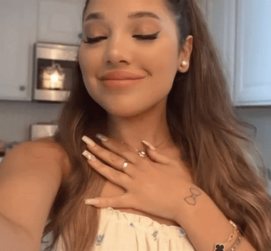 Girl Feeling Grateful And Flattered GIF