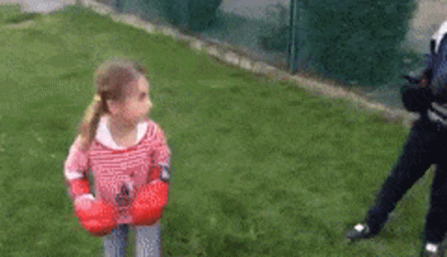 Girl Fighting The Boy GIF