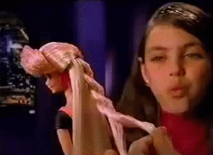 Girl Fixing Barbie Hair GIF