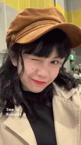 Girl Hat Trench Coat Winks See U Round4 GIF