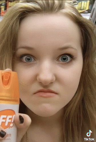 Girl Holding Bug Spray FF GIF
